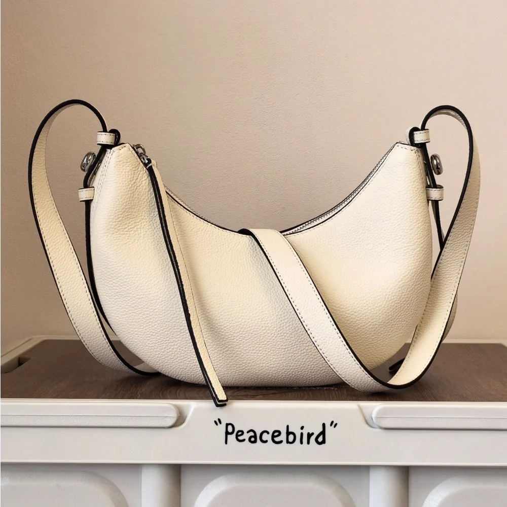 Tory Burch White Pebbled Crescent Shoulder Bag with Black Trim